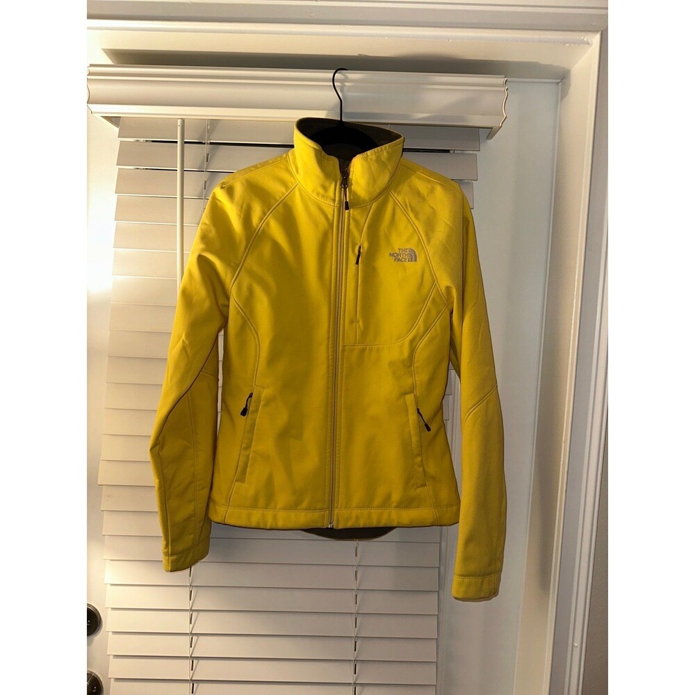 The north face yellow zip up jacket